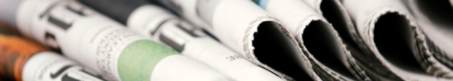 Folded newspapers